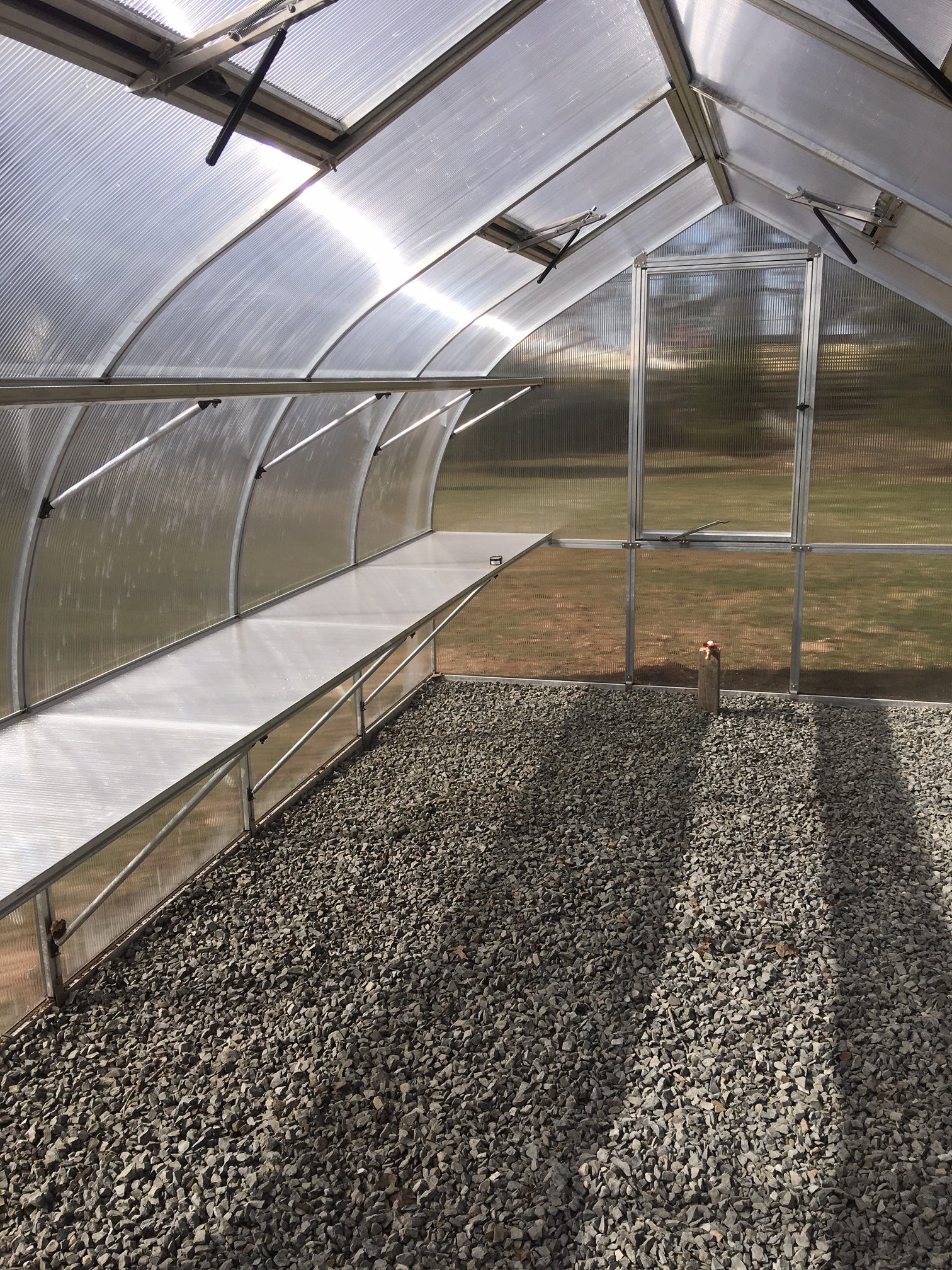 Riga 5 Polycarbonate Greenhouse Gravel Floor and Shelf