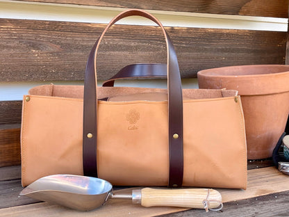 Tan leather bag for gardening