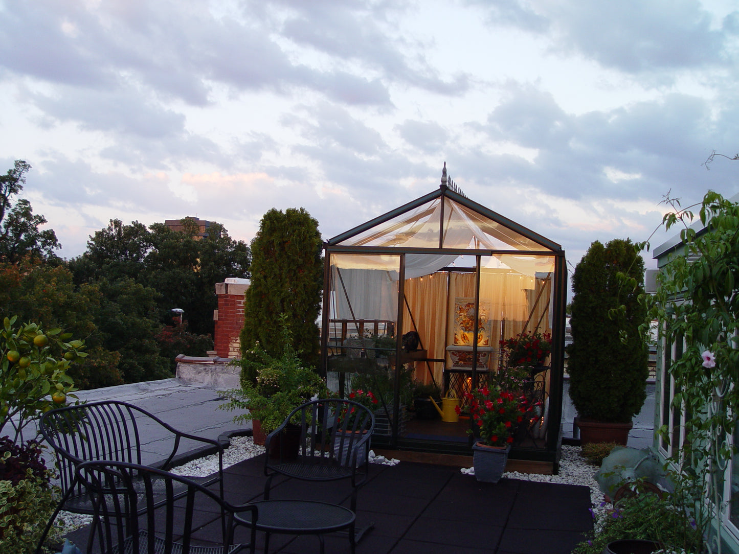 victorian greenhouse rooftop night lighting year-round Denver Colorado South Table Sheds