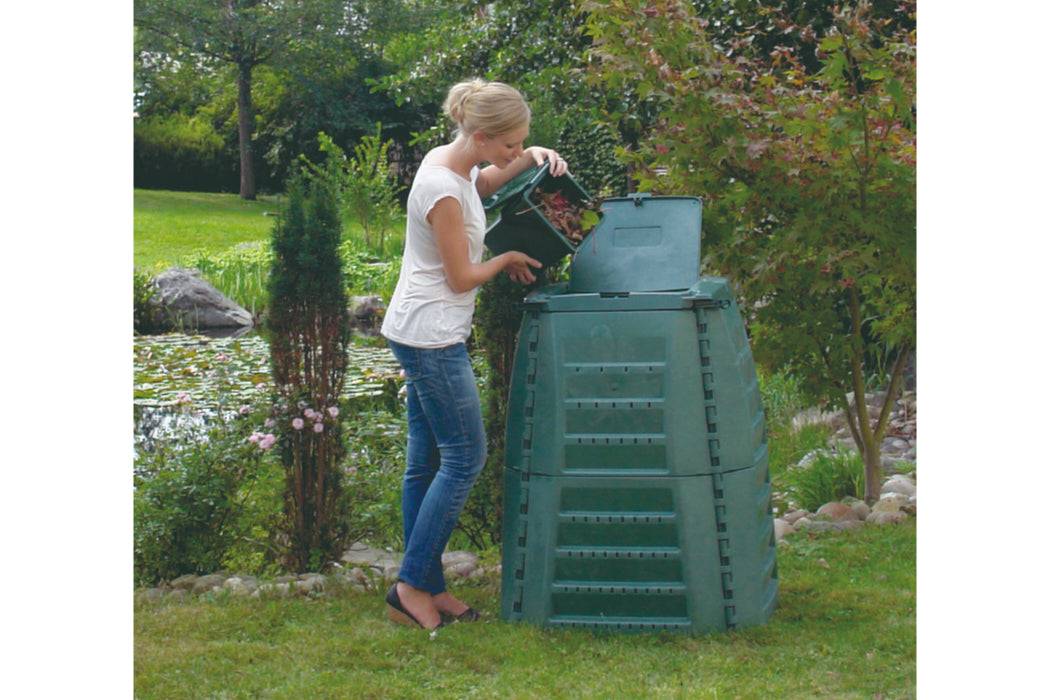 large compost bin in yard